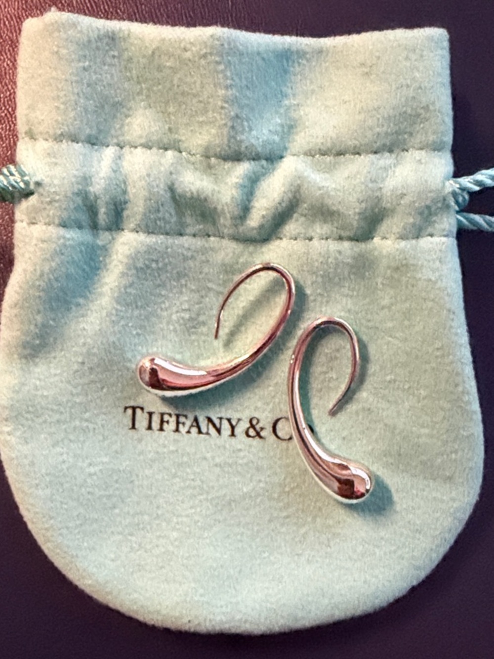 Tiffany & Co. Silver Teardrop Hook Earrings on Blue Pouch